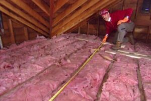 Attic Insulation being check and inspected